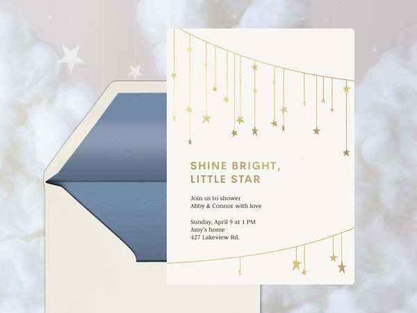 An invitation with gold stars.