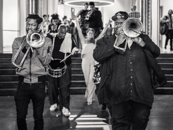 Photo of marching band playing at a birthday party.