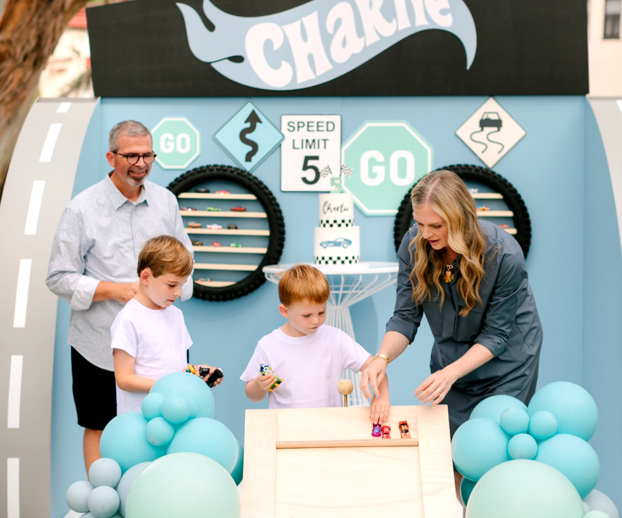 Kids at a car-themed birthday party.