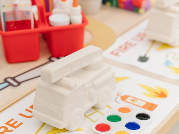 A paint-your-own firetruck activity at a birthday party.